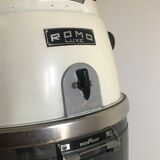 Vintage hairdresser's armchair with helmet transformed into a lamp