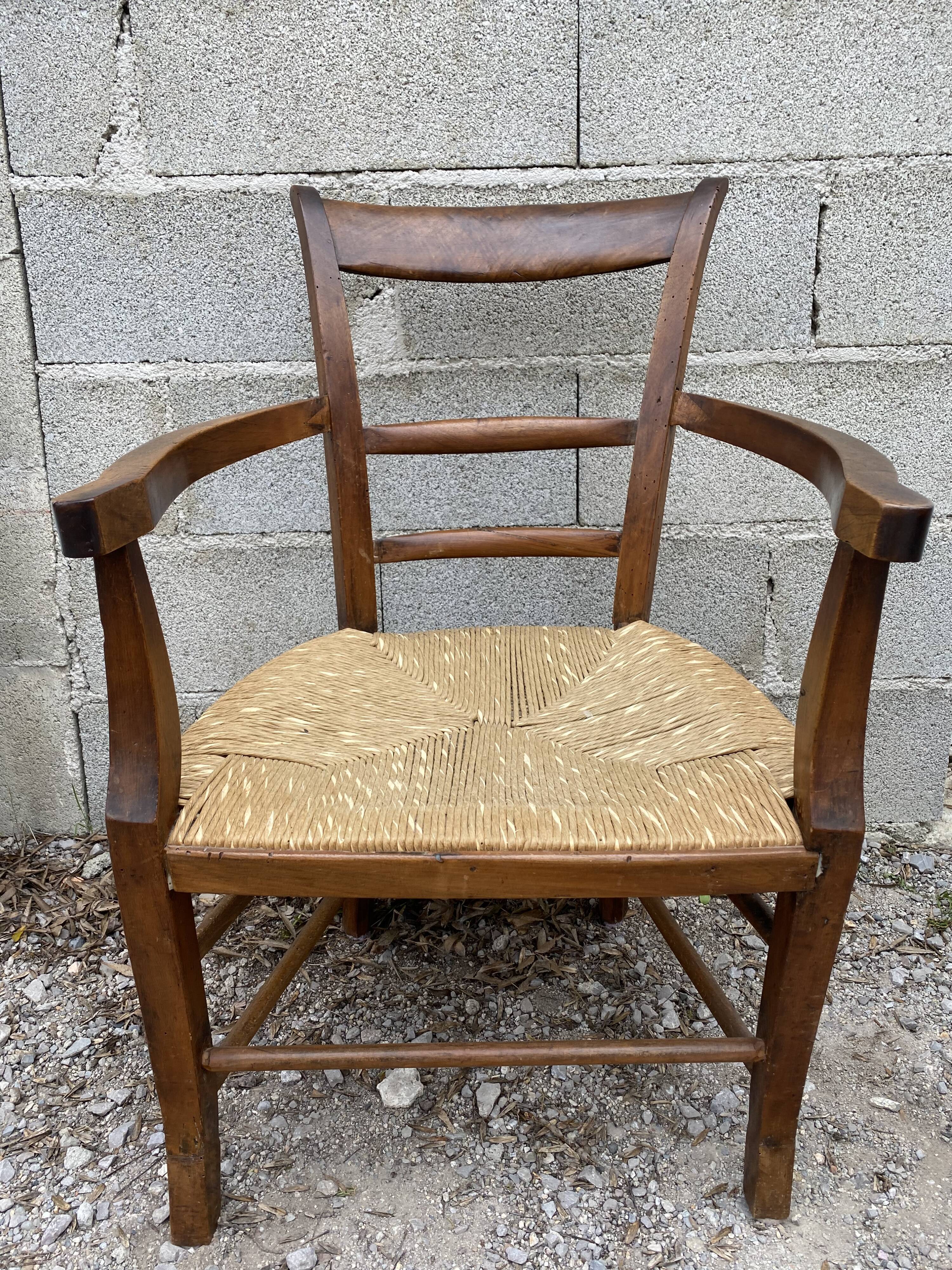 Antique straw armchair