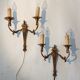 Pair of neoclassical sconces in bronze and gilded brass 1950.