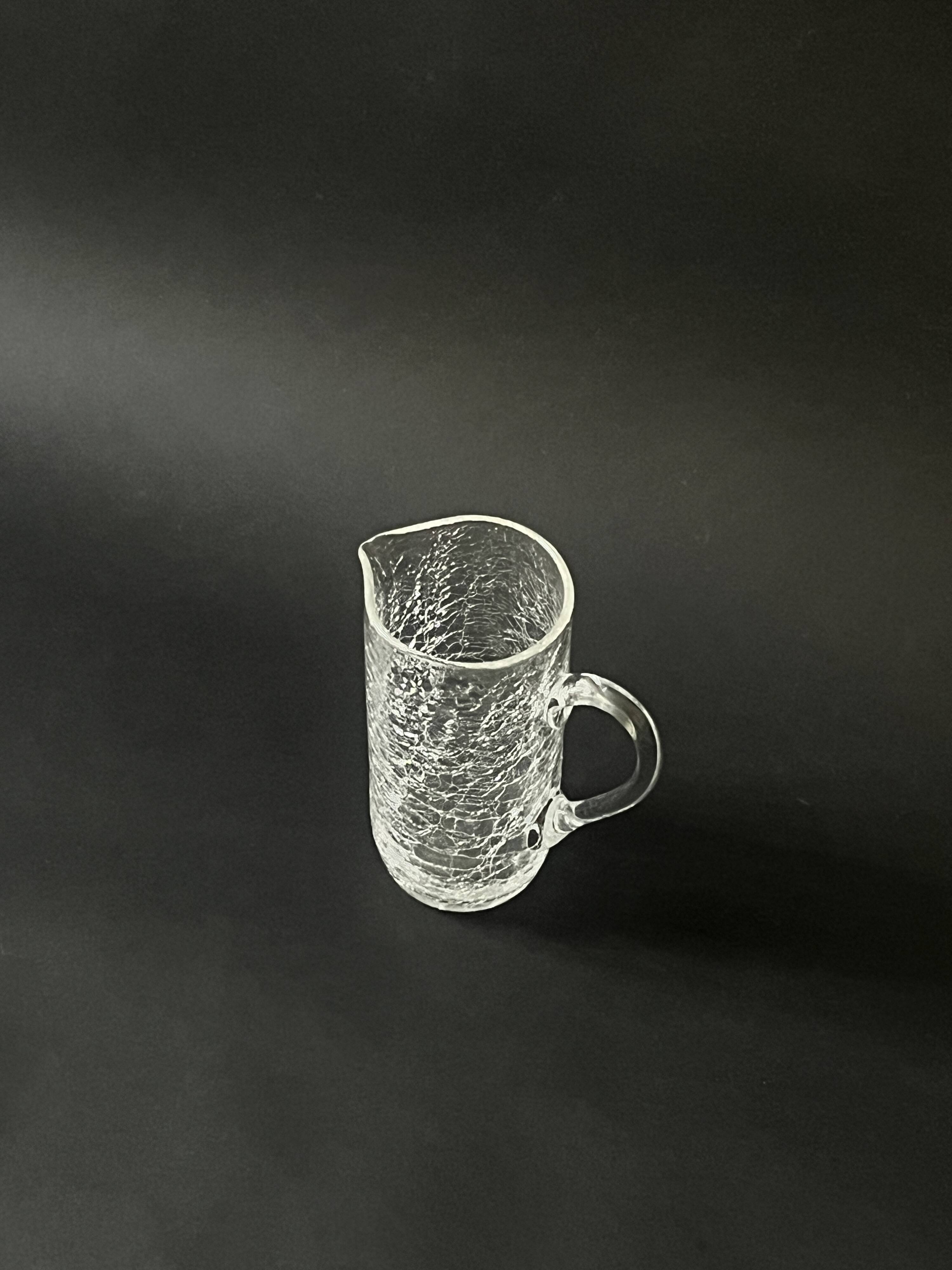 carafe à eau vintage en verre soufflée à la bouche