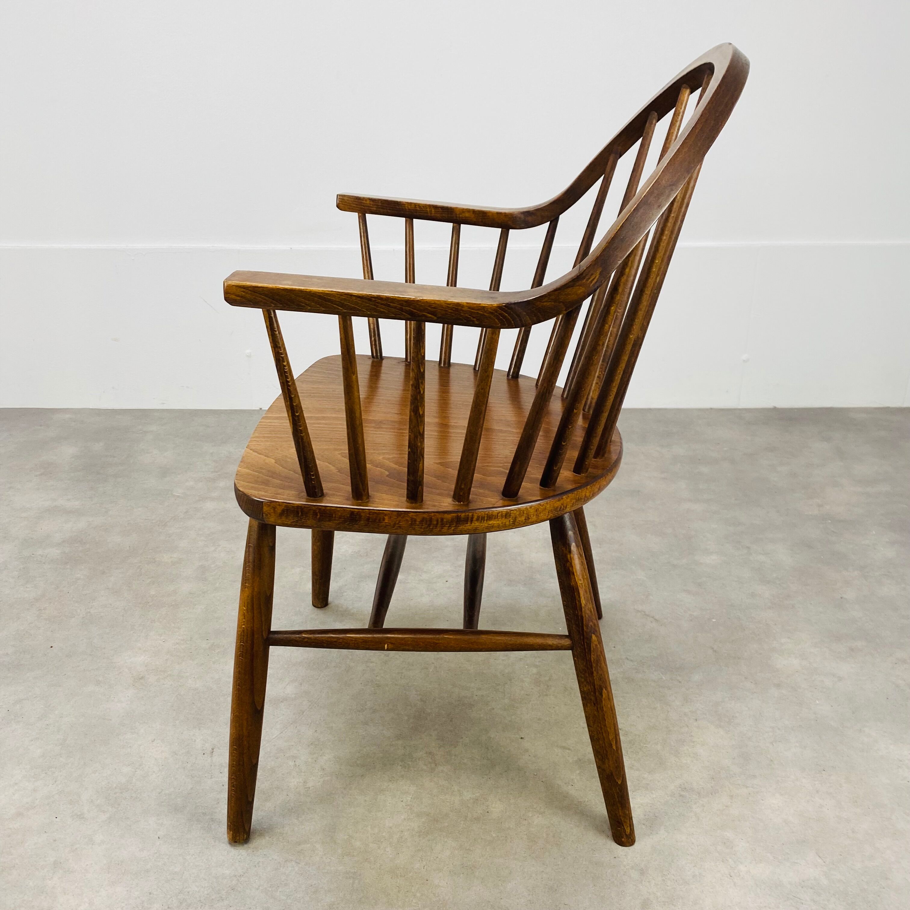 Baumann armchair with Scandinavian style bars, desk