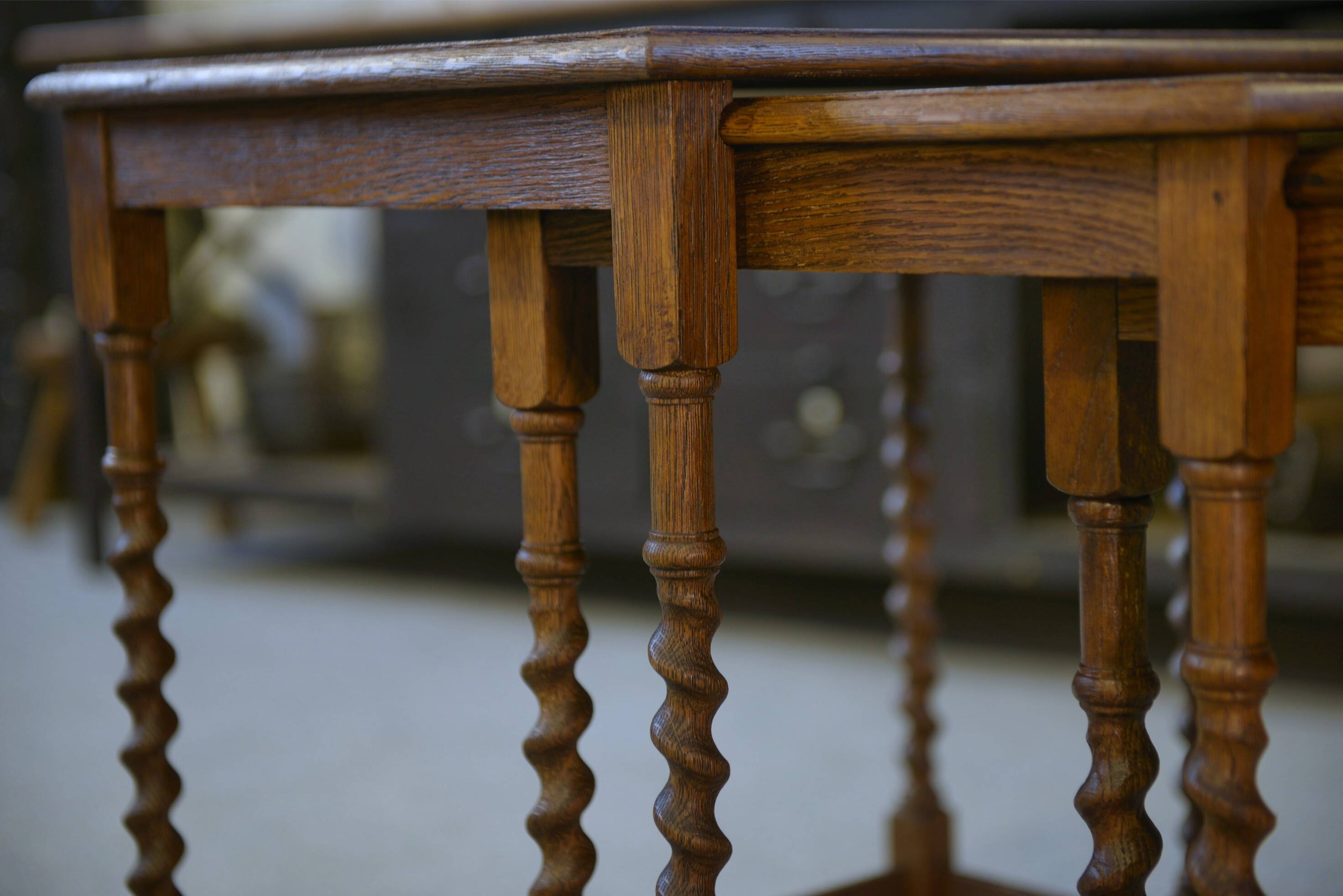 Rustic nesting tables in oak from the 1950s.