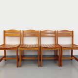Set of 4 vintage pine chairs from the 70s