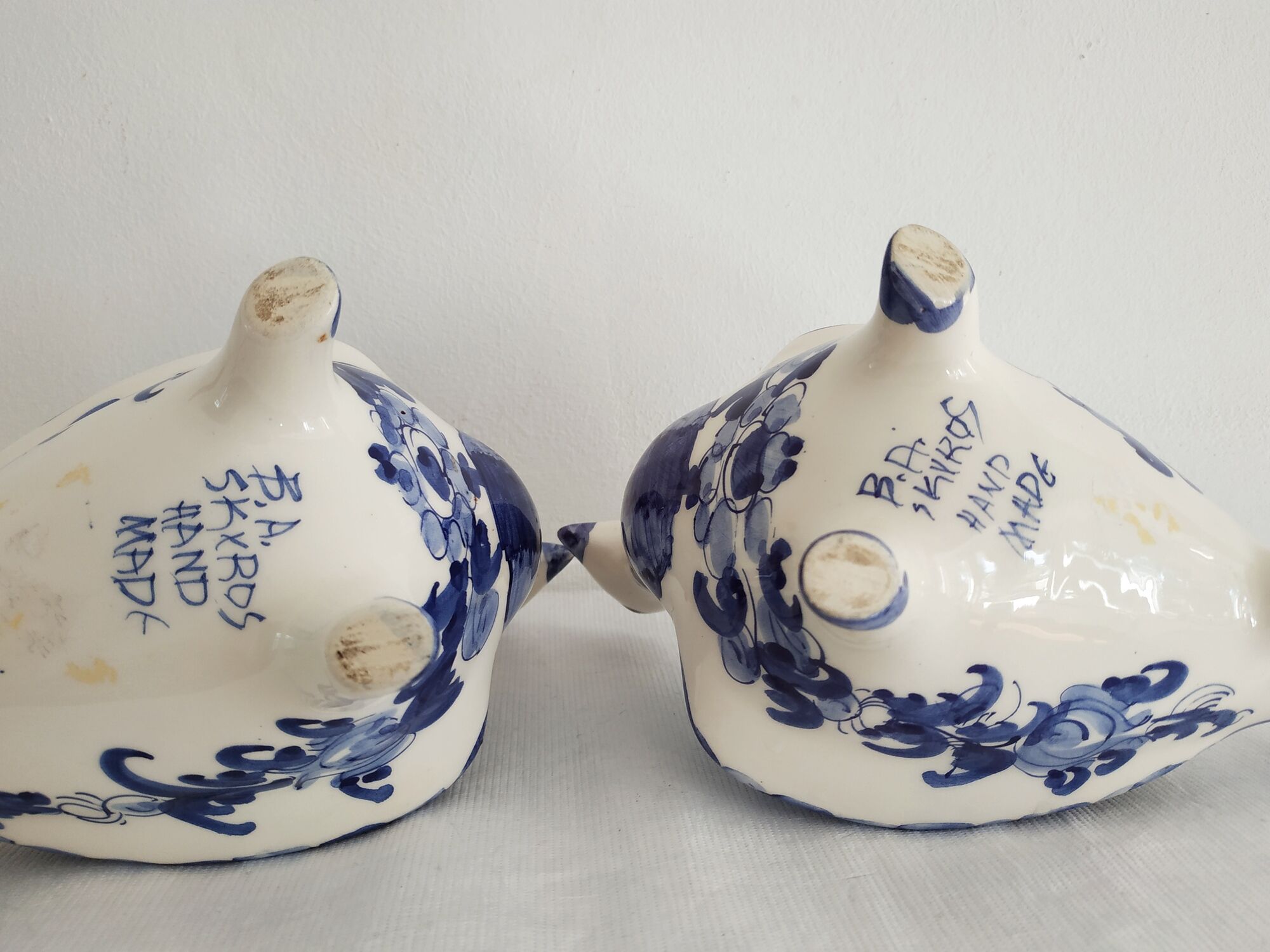 Pair of bird candlesticks in blue white, Skyros earthenware
