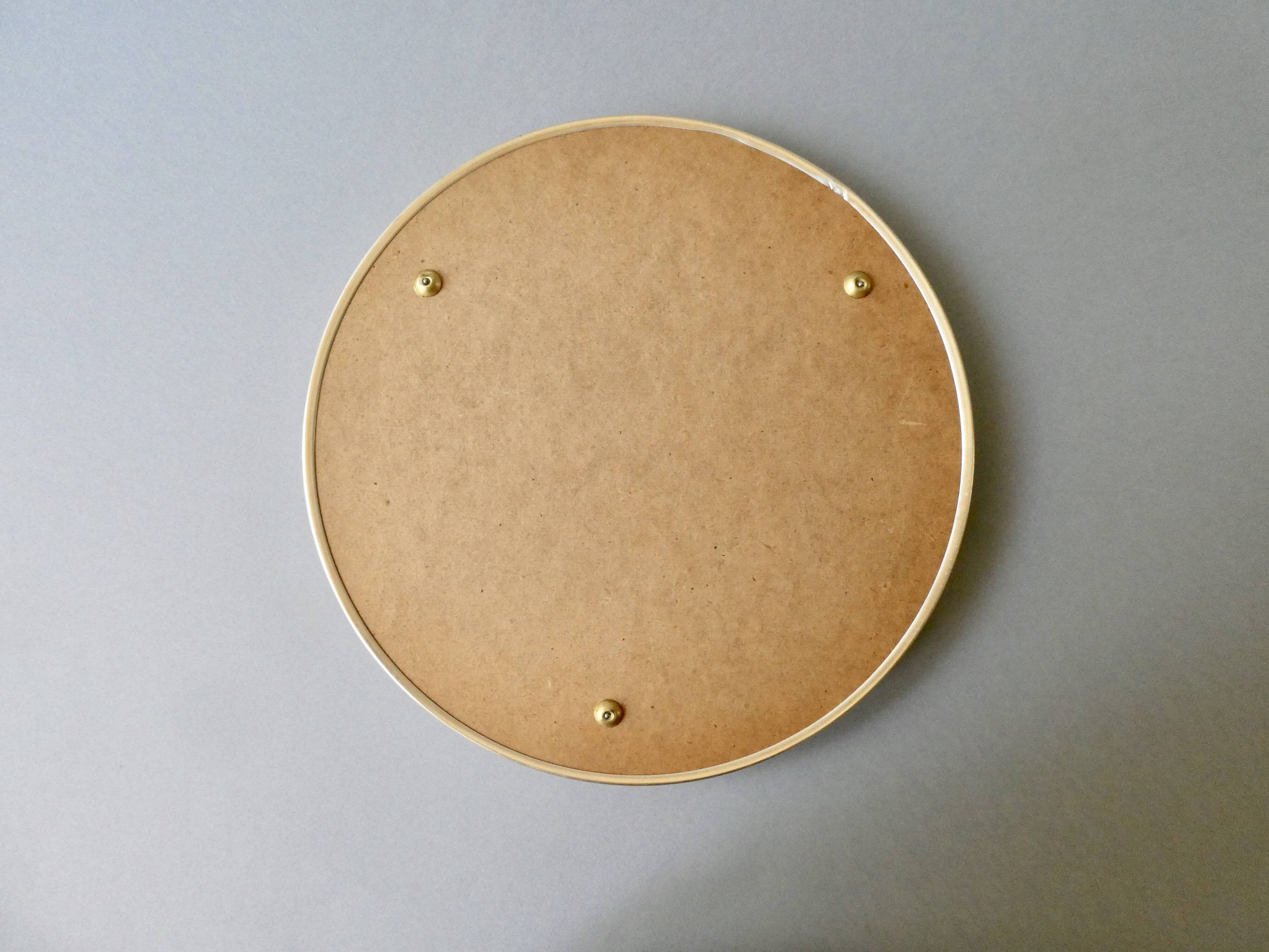 Mirror top in gilded aluminum, diameter 29 cm