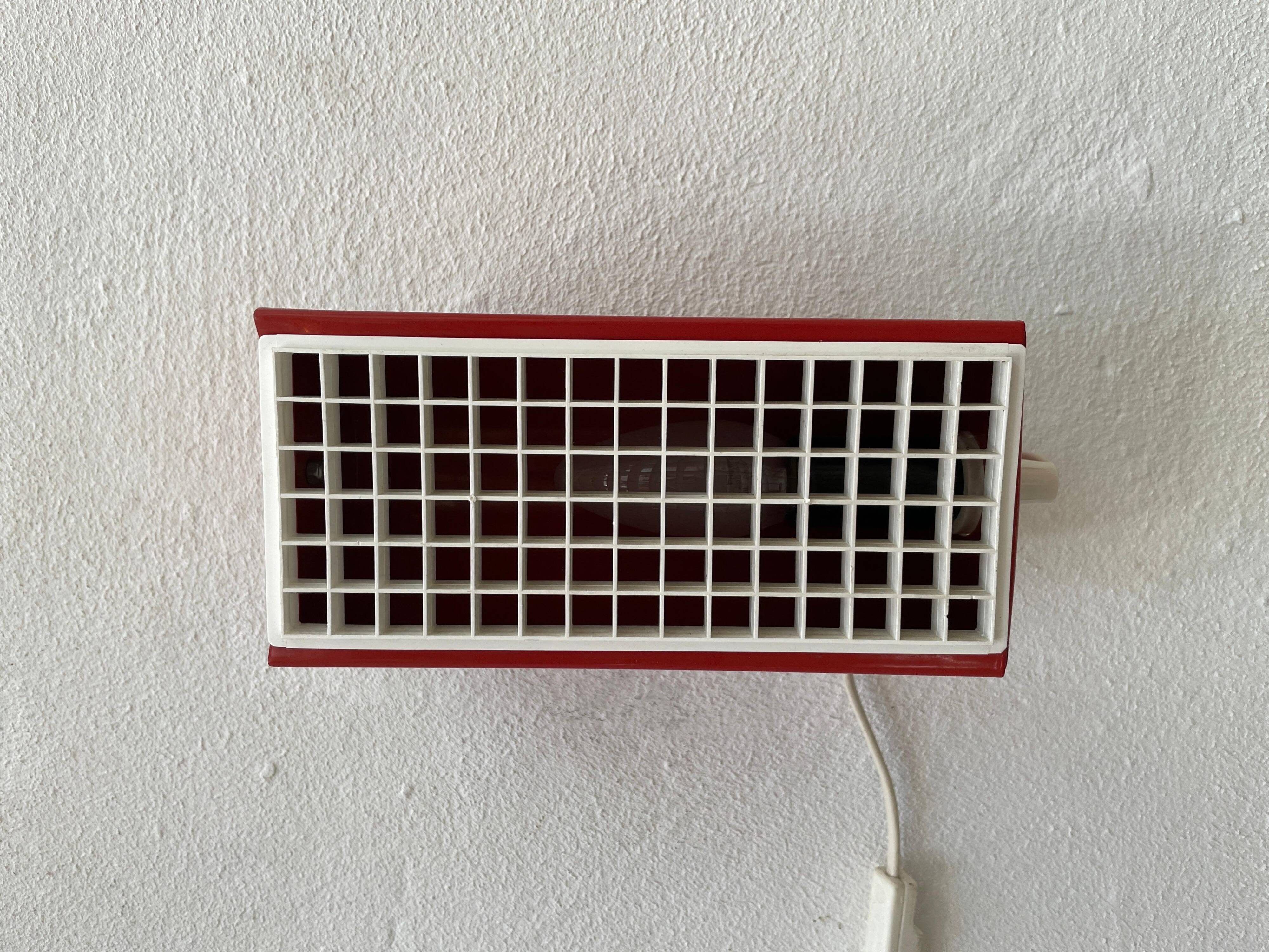Simple red metal wall light from the AGE, 1970s, Germany.