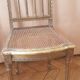 Paire Chaises cannées Louis XVI bois sculpté doré
