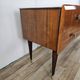 Mid-century drawer chest in mahogany, brass and glass.