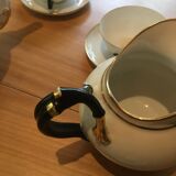 Service to tea by Richard Ginore