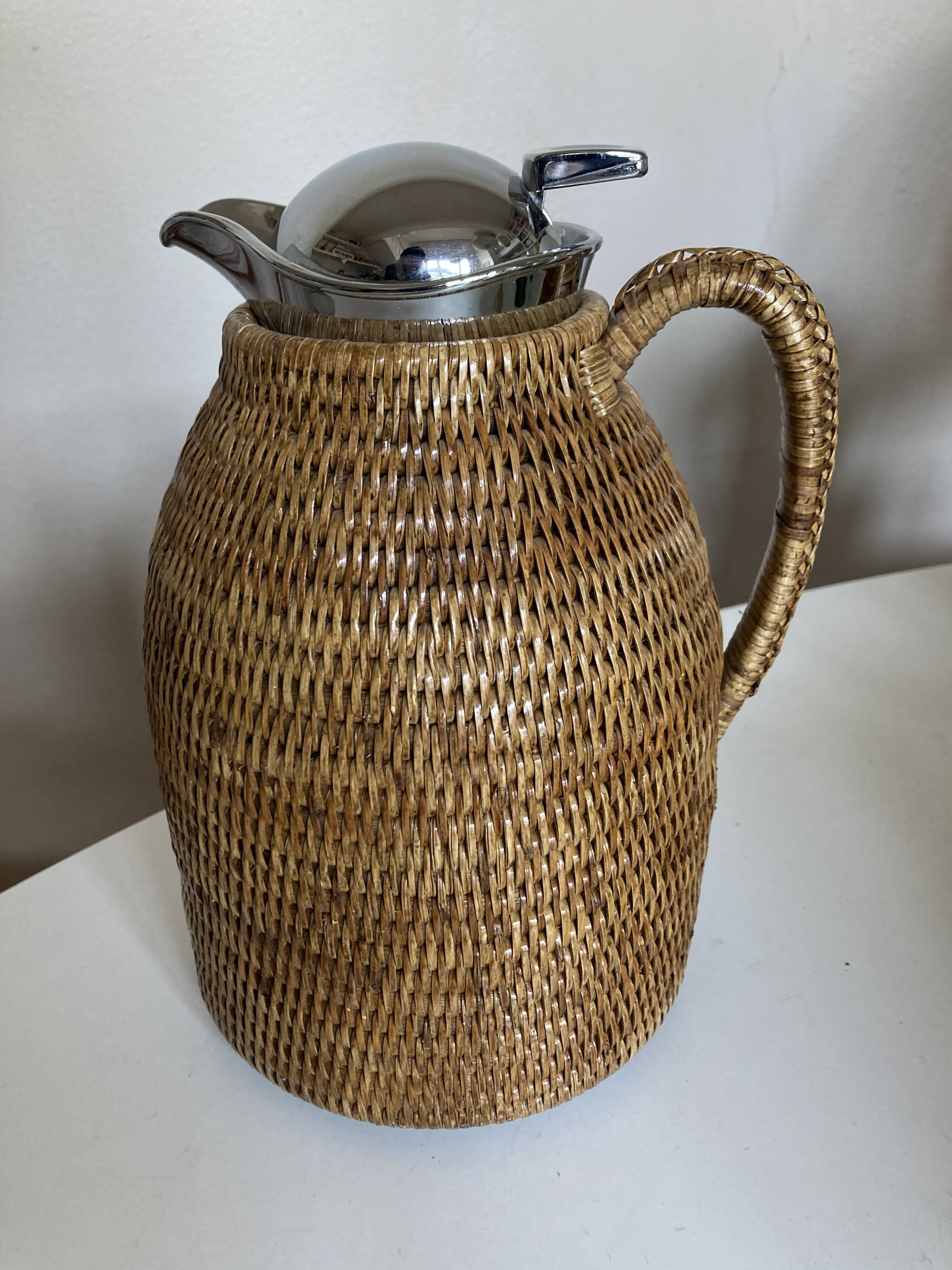 Wicker-covered thermos carafe designed by Ola Olson for Xtra 1980.