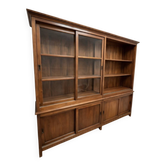 Large double-body showcase library in solid teak.