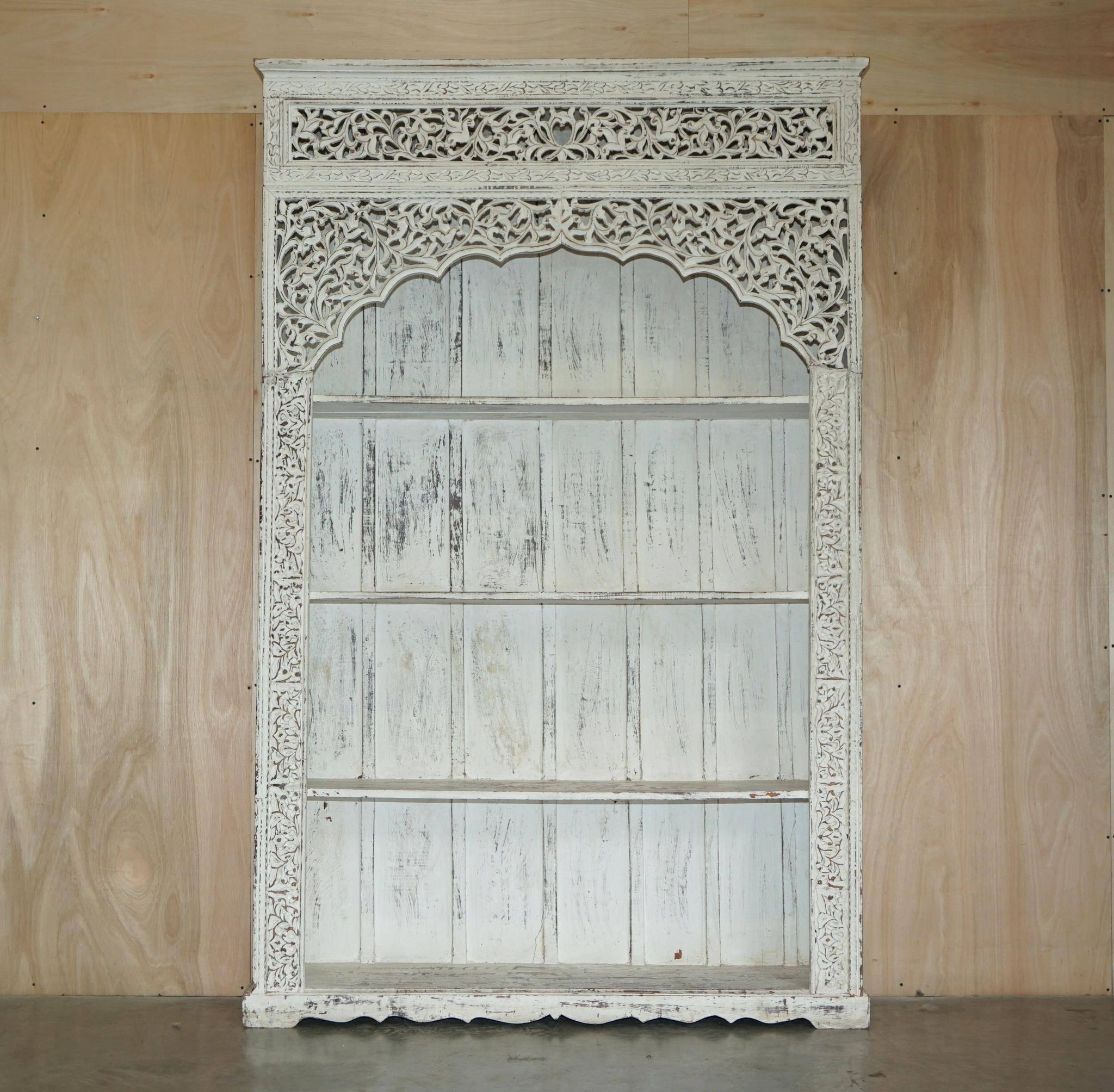 Large antique Anglo-Indian library in carved solid wood with original paint.
