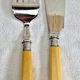 Antique Victorian fish serving cutlery, bone and silver-plated metal