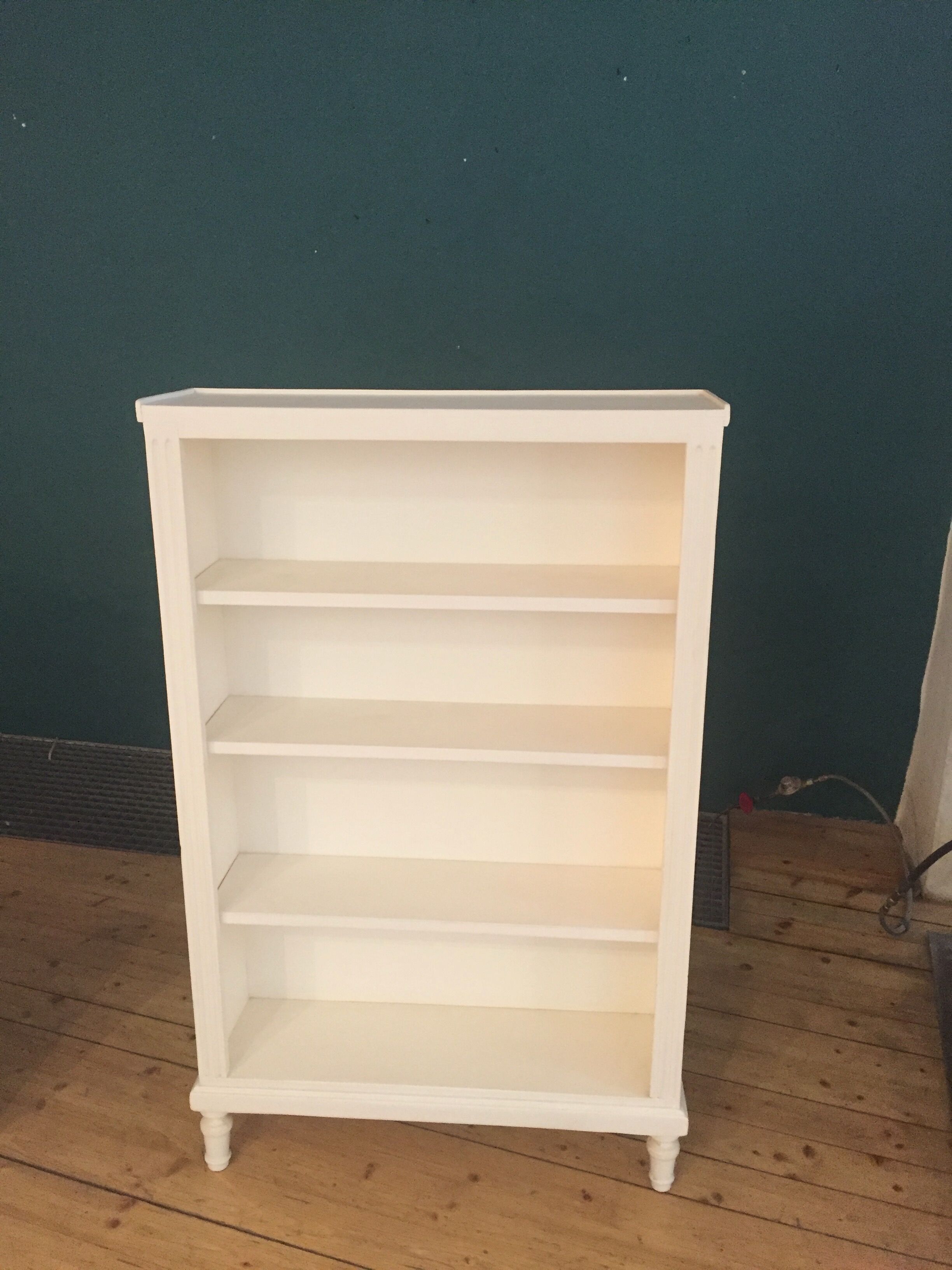 Old bookcase shelf matte white color