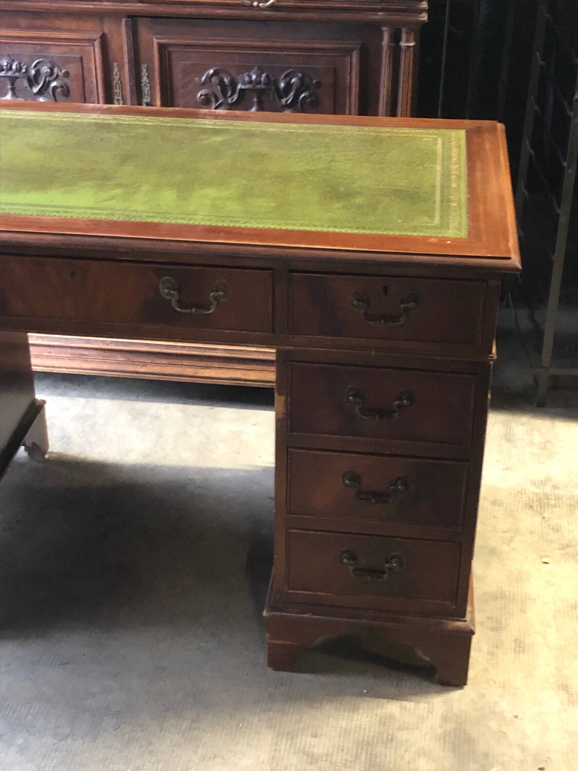 English pedestal desk with green leather top
