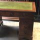 English pedestal desk with green leather top