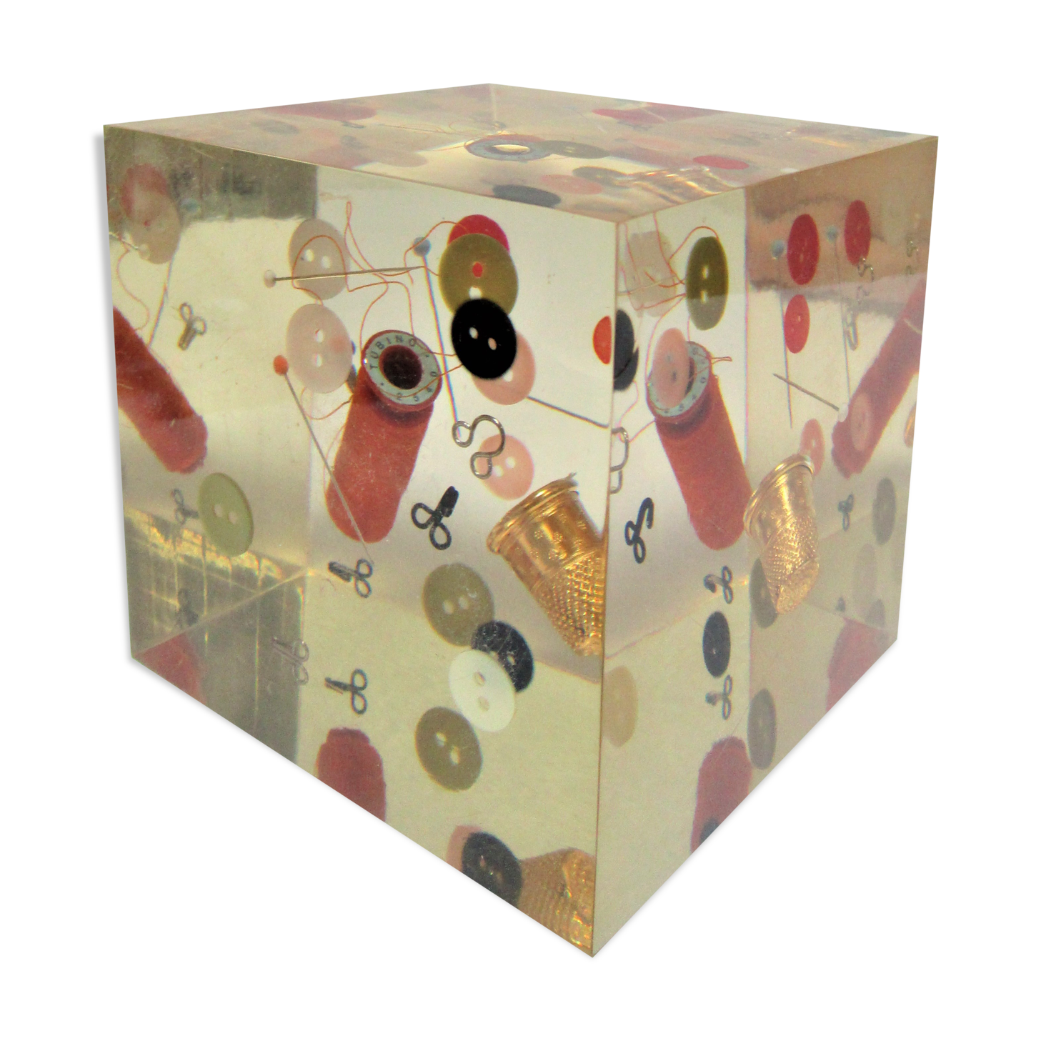 Paperweight sculpture block resin inclusions sewing design 70s