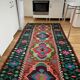 Moldavian runner rug with stylized flowers and geometric design
