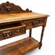 Victorian Gothic Oak side table, decorative carved round 1920. Green Mask decoration