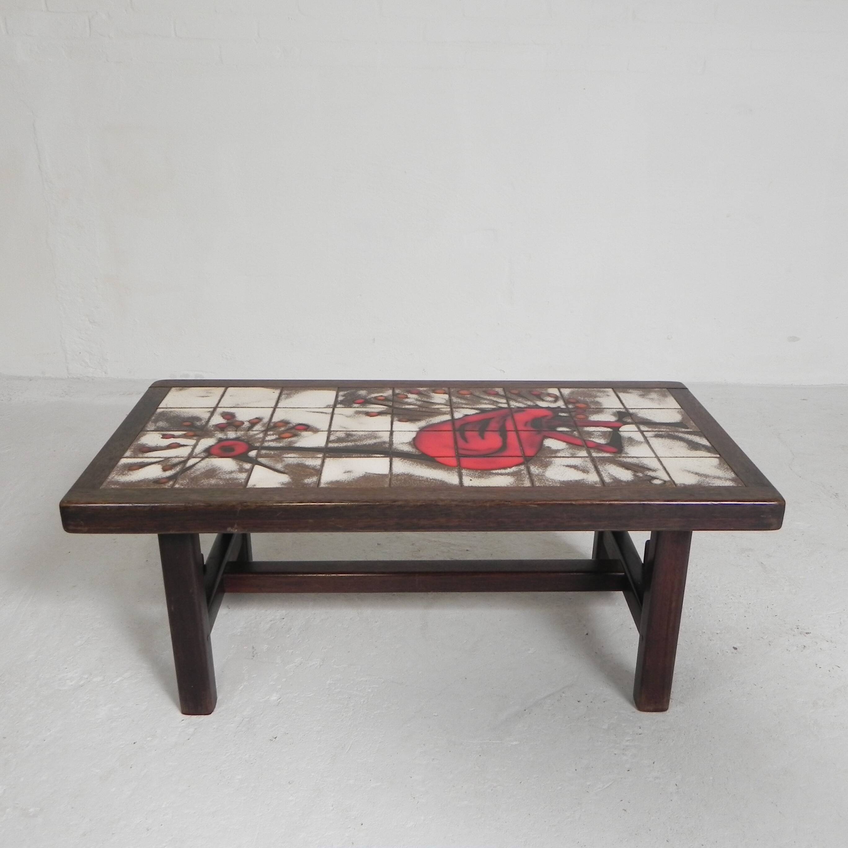 Square tile table from Vallauris, signed Dan with an image of a fantastic bird, 1960s.