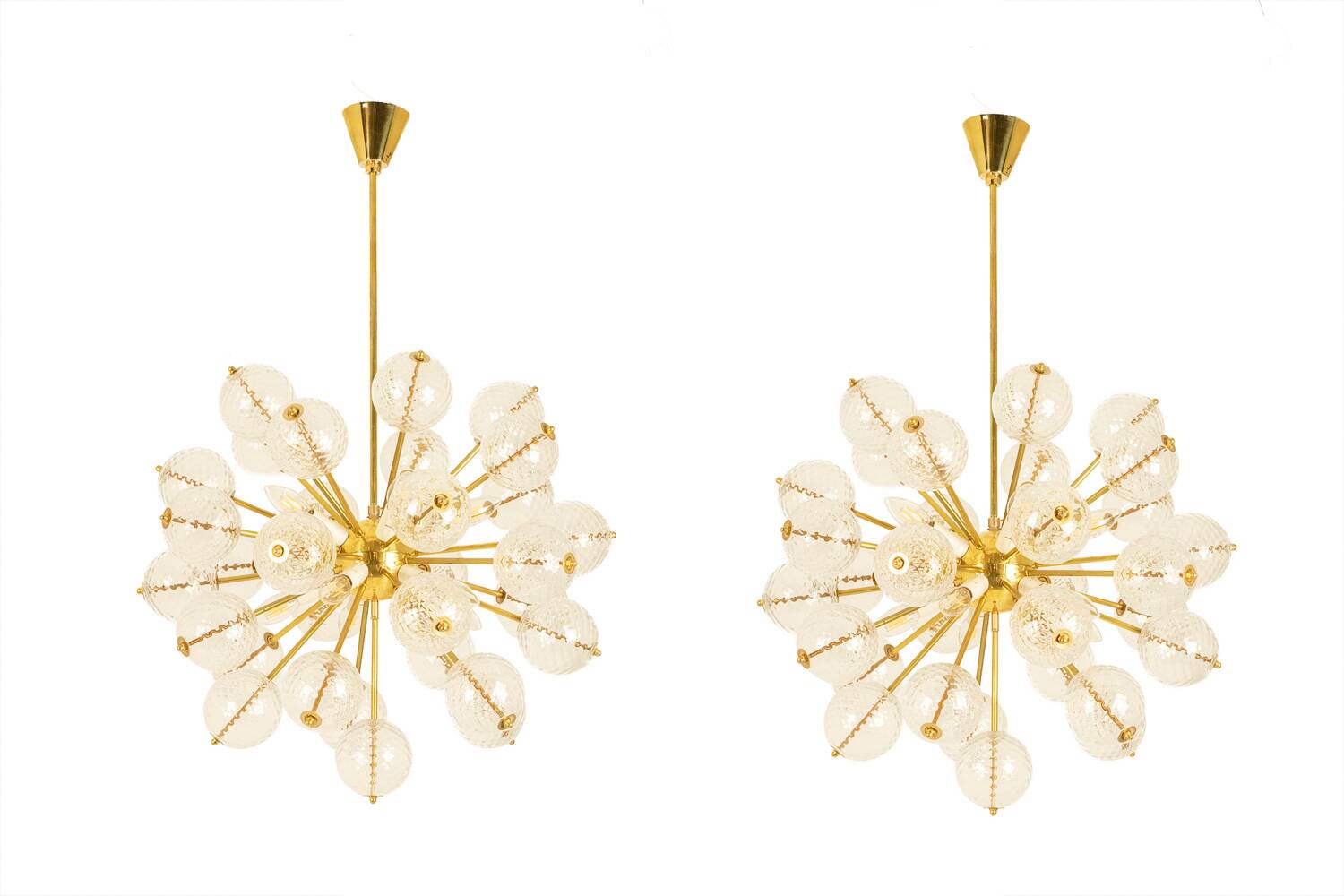 Kamenický Šenov, published by. Pair of brass and glass chandeliers. Around 1970.