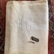 Drap en metis monogramme HG.