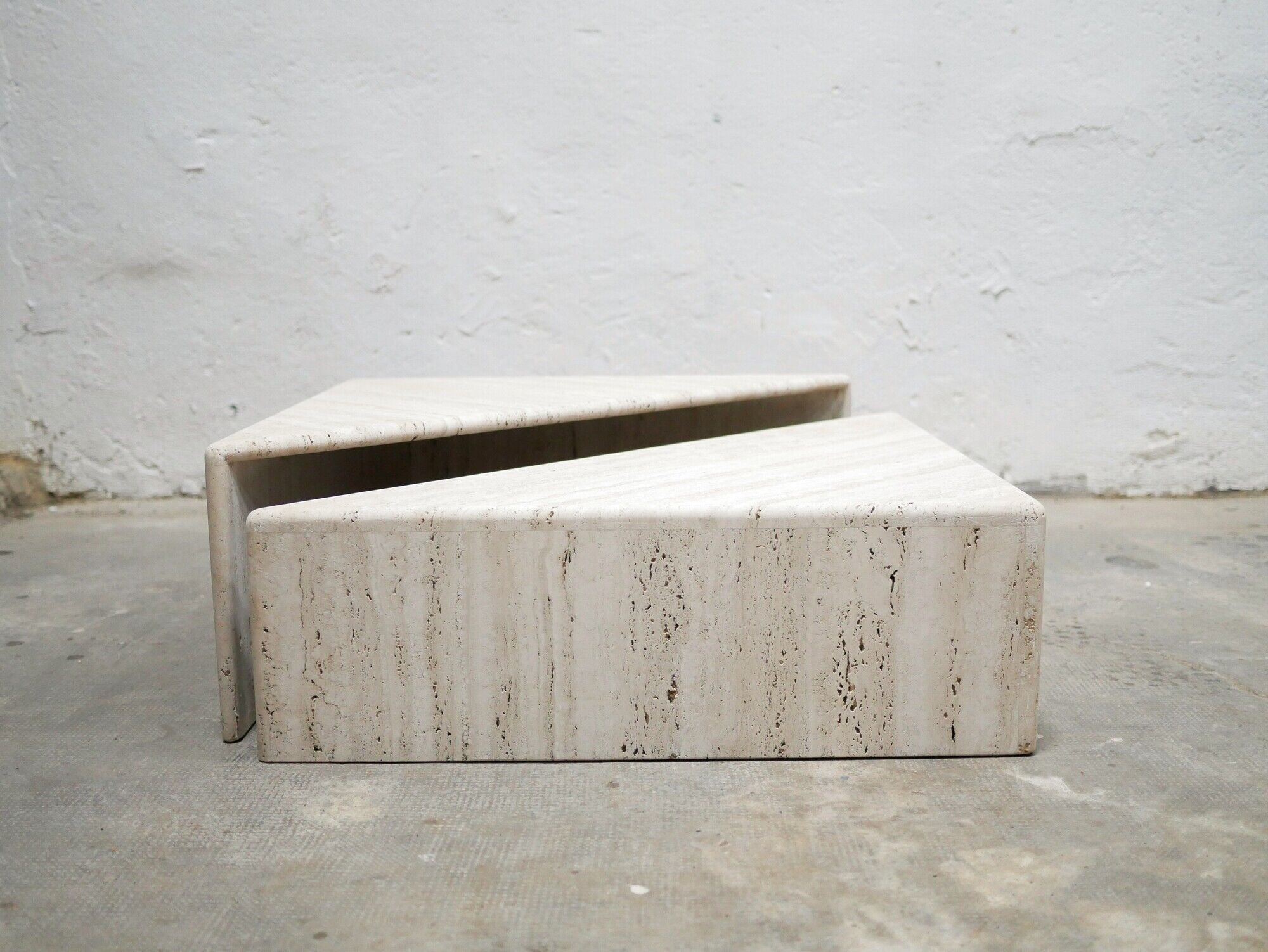 Series of 2 vintage travertine coffee tables published by Roche Bobois