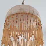 Lustre pate of glass and tassels