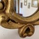 Golden mirror in baroque style.