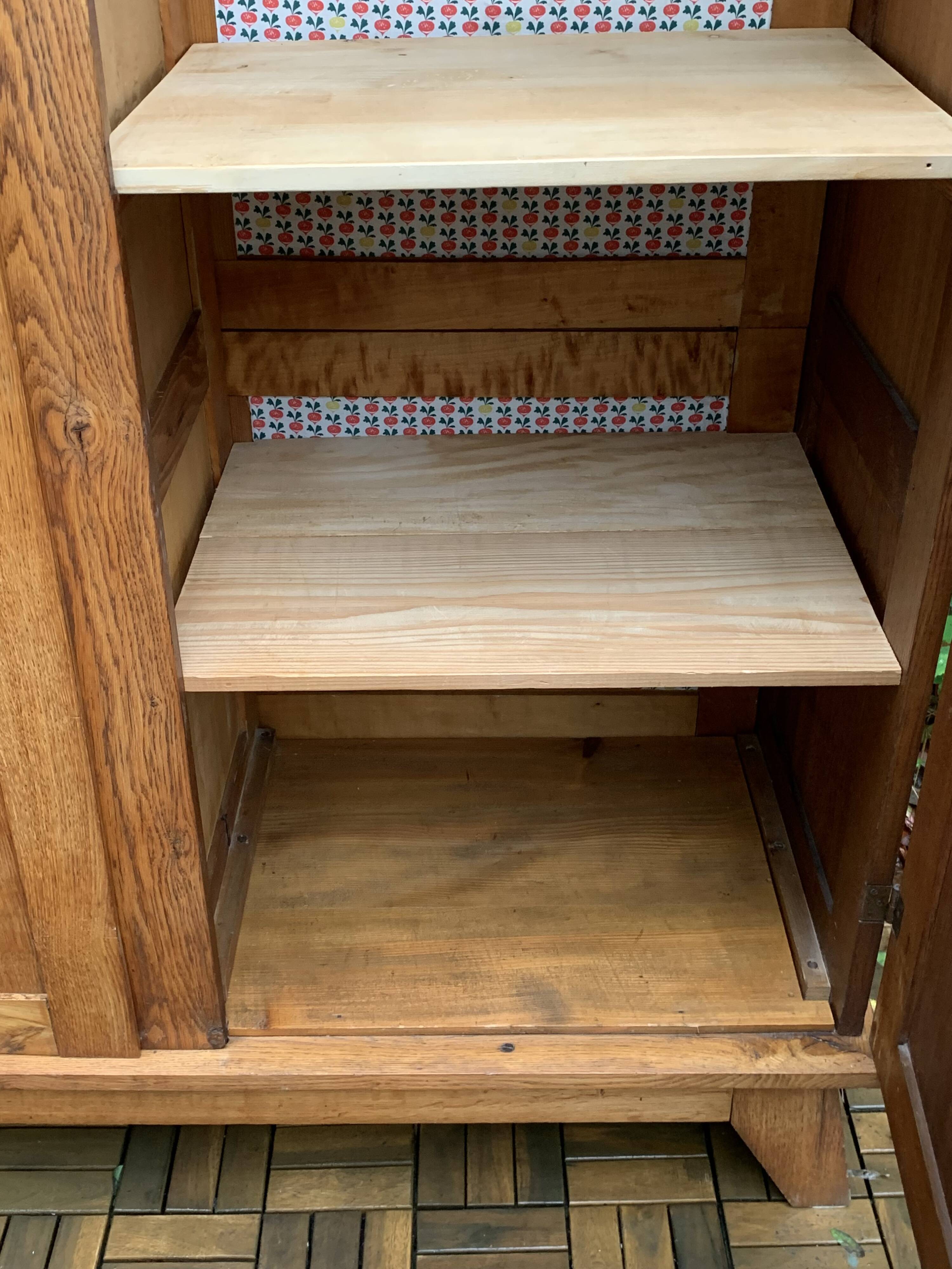 Solid oak compass foot cabinet René Gabriel 1945