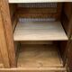 Solid oak compass foot cabinet René Gabriel 1945