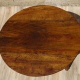 Antique walnut table with drop-leaf doors