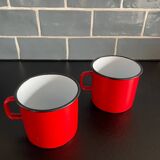Red enameled sheet metal mug