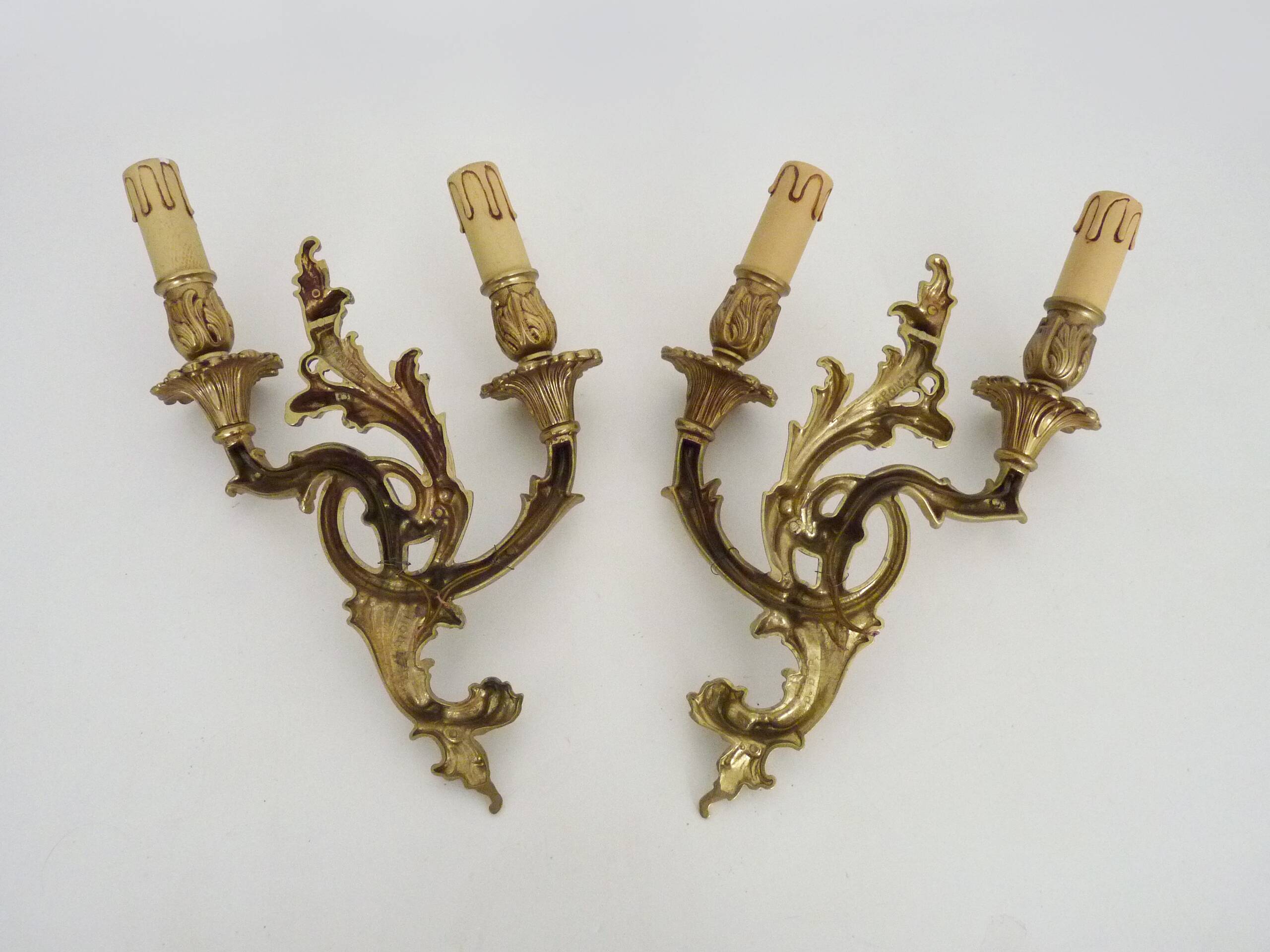 Vintage pair of double wall sconces in bronze from the 1960s.