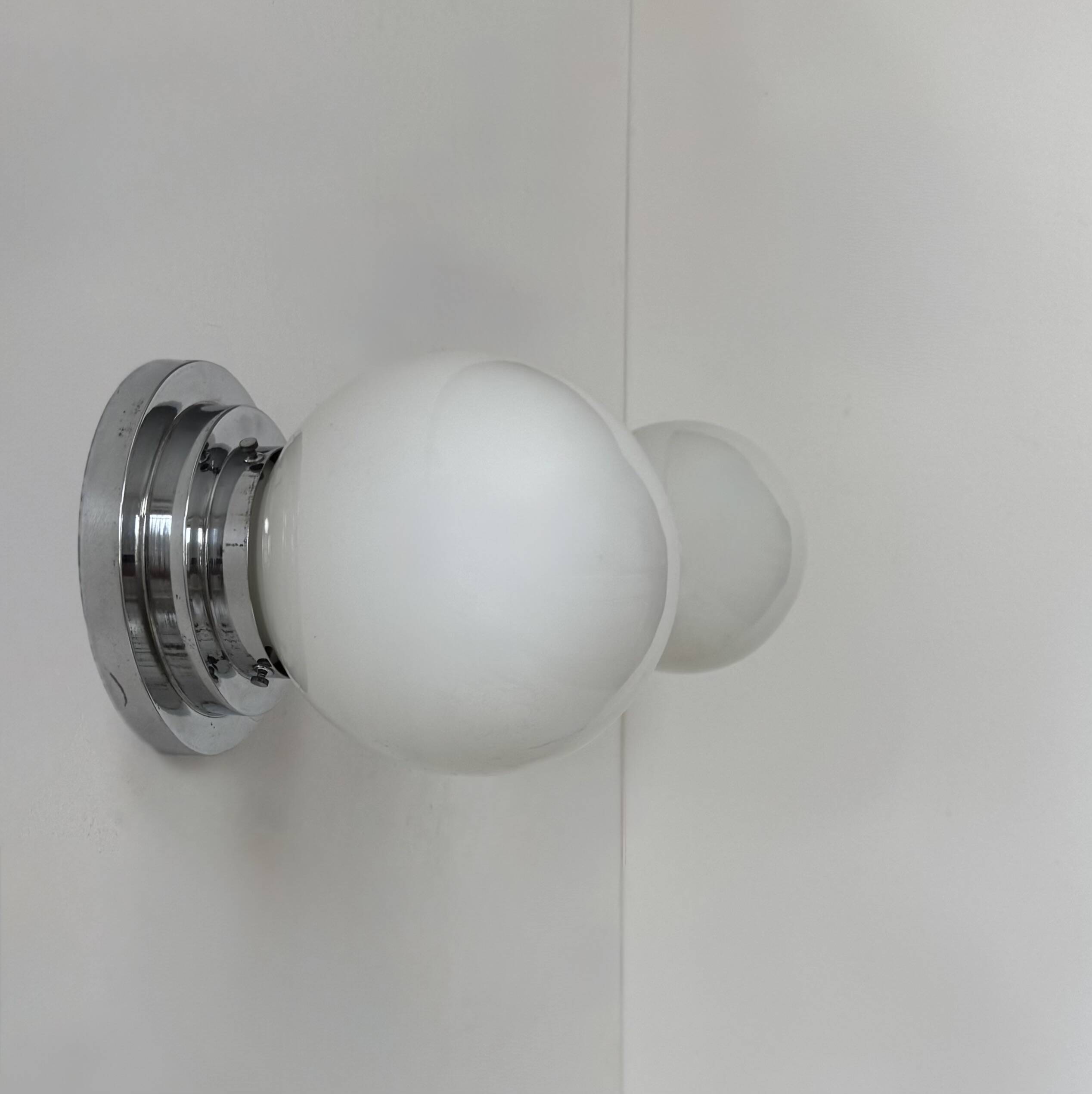 Pair of vintage modernist Art Deco wall lights, chrome and opaline, France