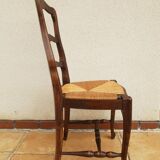 Regence chairs in straw-covered oak