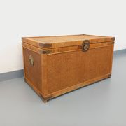 Vintage trunk in wood, rattan, caning, and brass.