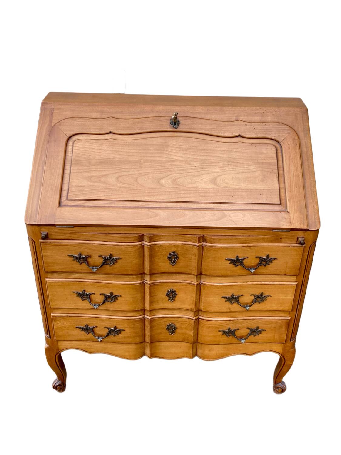Louis XV style writing desk with a curved back.