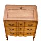 Louis XV style writing desk with a curved back.