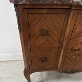 Transitional style commode with a protruding front, in marquetry wood, 20th century.