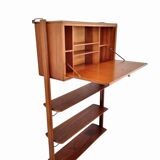 Small walnut and brass wall unit with desk function by William Watting
