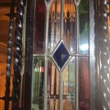 Wrought iron lantern with colored stained glass