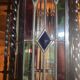 Wrought iron lantern with colored stained glass
