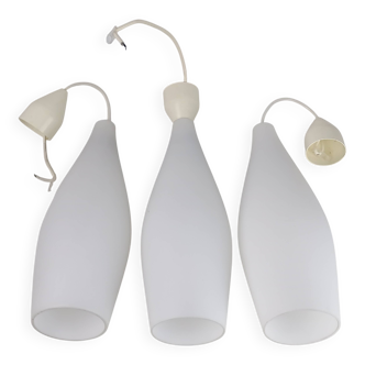 Superb set of three Holmegaard white opaline glass pendant lights