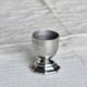 Vintage silver-plated egg cup with an octagonal base.