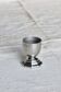 Vintage silver-plated egg cup with an octagonal base.