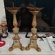 Pair of antique candlesticks in carved wood with acanthus leaf decoration