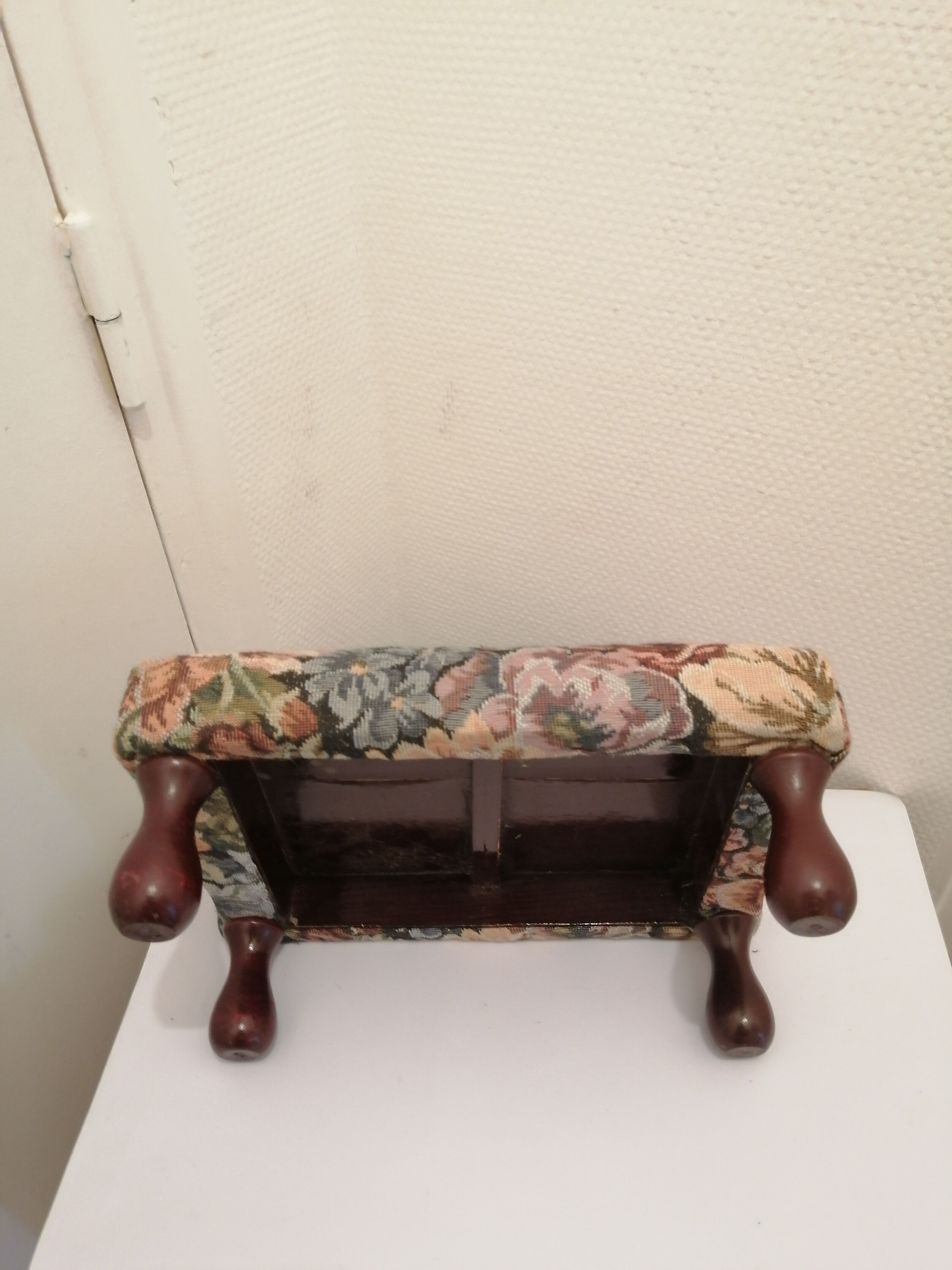 Vintage footrest in wood and fabric