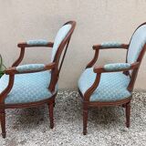 Paire de fauteuils médaillon style Louis XVI