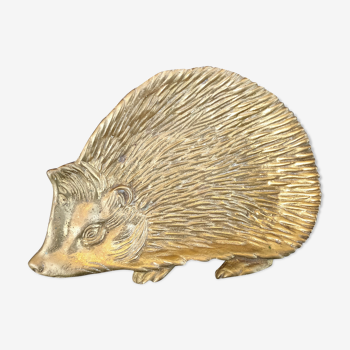 Empty brass hedgehog pocket